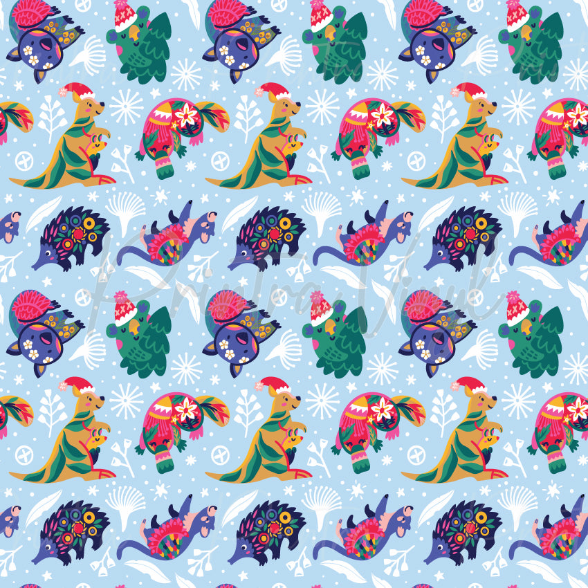 Aussie Christmas #01 patterned vinyl featuring colourful Australian wildlife including kangaroos, koalas, echidnas, wombats, cockatoos, and emus dressed in festive Christmas accessories, surrounded by native botanical elements, snowflakes, and holiday details on a soft blue background.