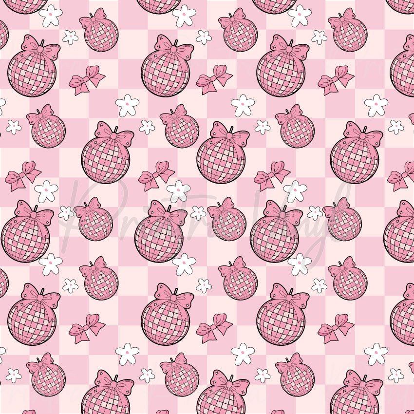 Disco Bows patterned vinyl featuring pink disco balls topped with ribbon bows, scattered across a soft pink checkerboard background with white floral accents for a fun retro-inspired design.