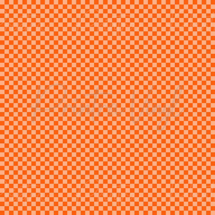 Halloween Essentials #02 patterned vinyl featuring a classic orange and peach checkerboard design with small alternating squares, creating a bright retro-inspired Halloween staple with a clean geometric look.