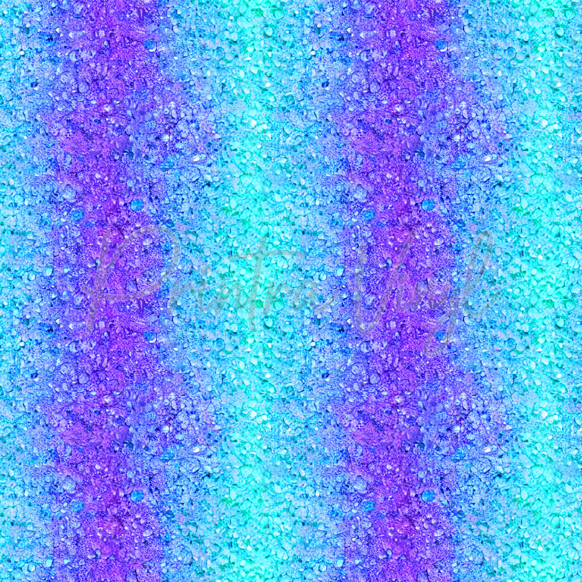 Lagoon Crush patterned vinyl featuring shimmering aqua, turquoise, and violet crystal textures, sparkling crushed gemstone effects, and layered glitter-inspired details in a vibrant abstract design.