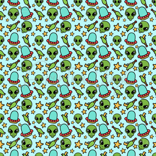 Alien Zaps patterned vinyl featuring cute green alien heads, retro flying saucers, vintage ray guns, and scattered golden stars on a light blue background for a fun space-themed design.
