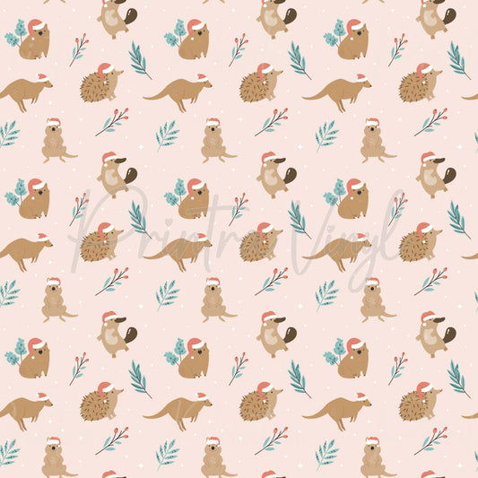 Aussie Christmas #03 patterned vinyl featuring adorable Australian animals including koalas, wombats, echidnas, platypuses, kangaroos, and quokkas wearing festive Santa hats, surrounded by native eucalyptus leaves and botanical accents on a soft blush pink background.