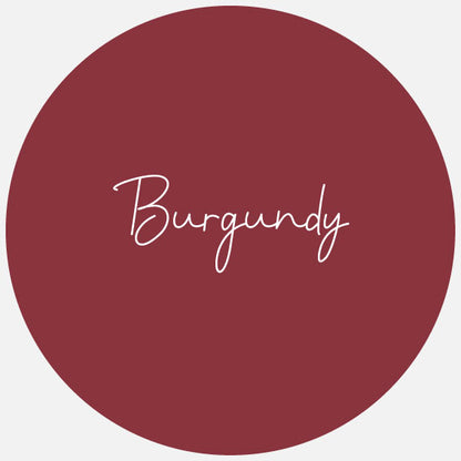 A round sample swatch of Avery Dennison Gloss Permanent Adhesive Vinyl in the colour Burgundy.