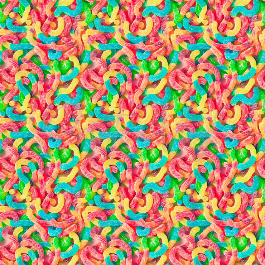 Candy Shop #01 patterned vinyl featuring colourful gummy worms in vibrant pink, blue, yellow, green, and orange tones, layered into a bright candy-filled design with realistic sugary textures and playful confectionery details.