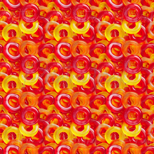 Candy Shop #05 patterned vinyl featuring vibrant red, orange, and yellow gummy ring lollies layered into a colourful candy-filled design with glossy textures and bright confectionery details.