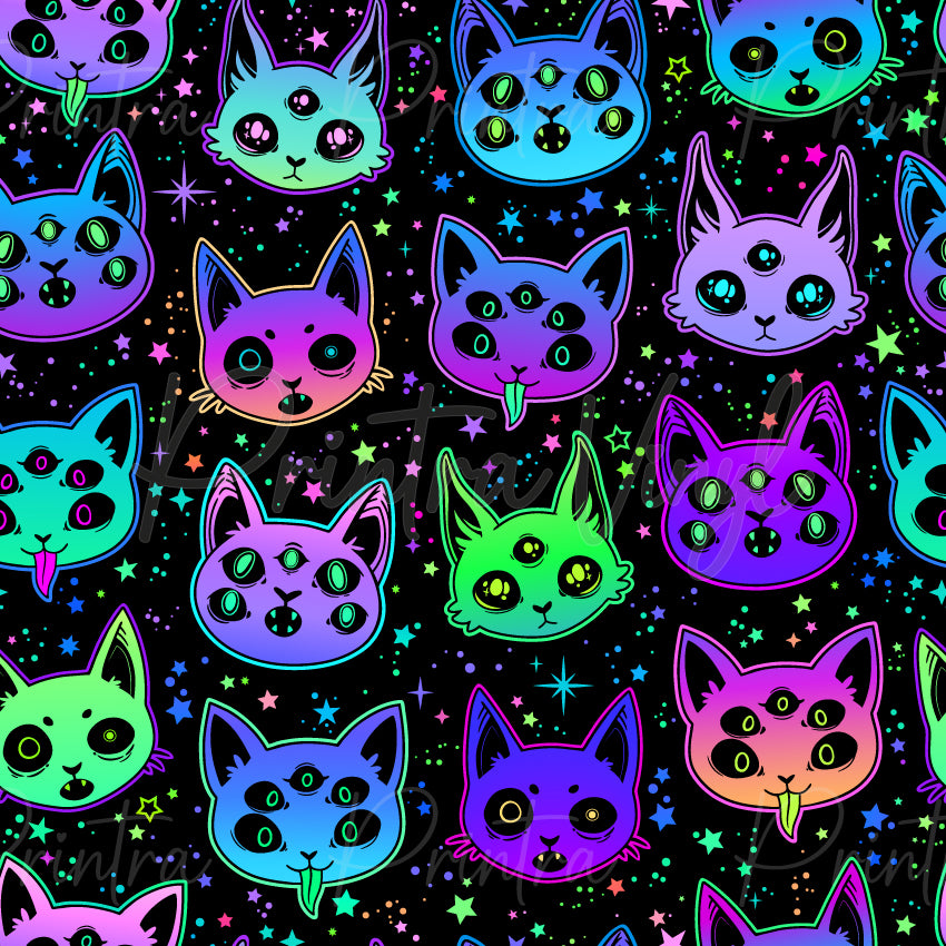 Creepy Cats #01 patterned vinyl featuring colourful spooky cat faces in vibrant shades of purple, pink, aqua, blue and lime green, with extra eyes, third-eye details and playful mystical features, scattered across a black background with neon stars, sparkles and celestial accents.