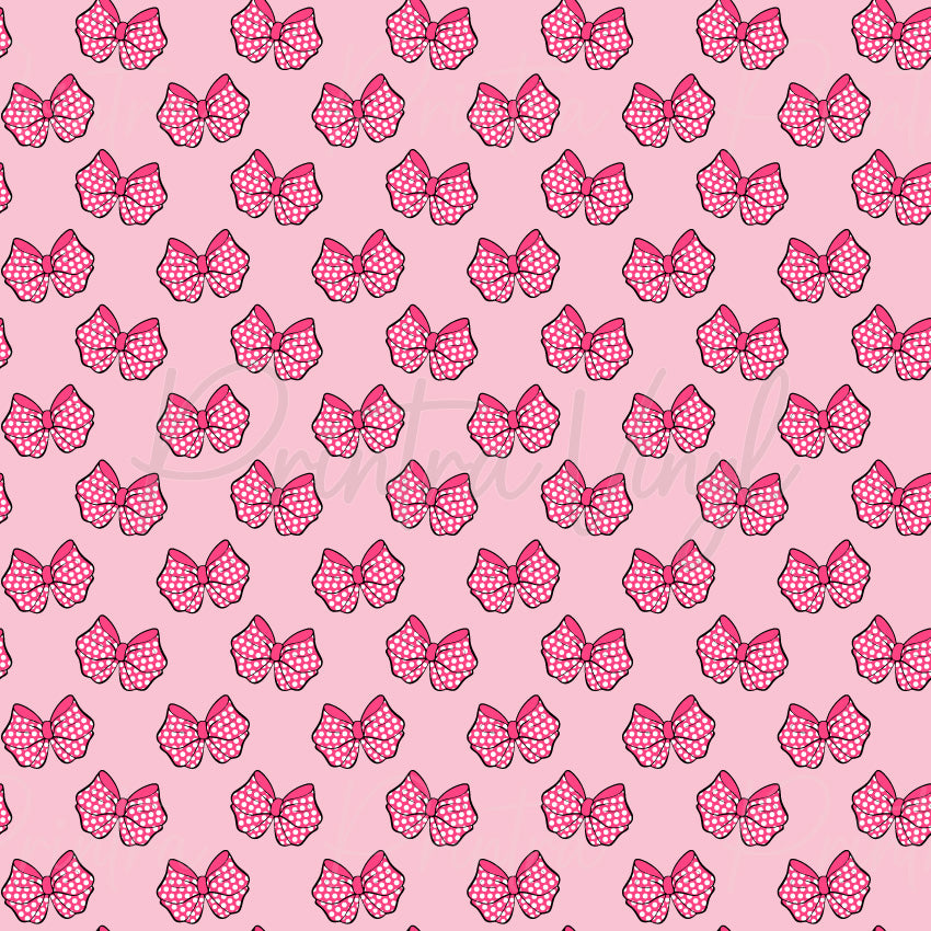 Dotty Bow Delight patterned vinyl featuring bright pink polka dot bows scattered across a soft blush pink background, creating a fun and playful all-over bow design.