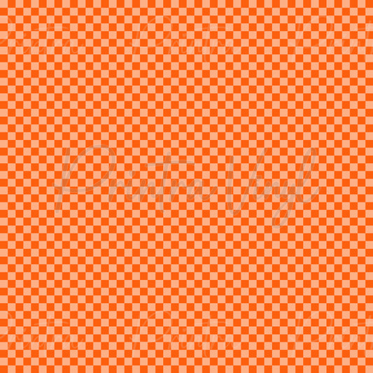 Halloween Essentials #02 patterned vinyl featuring a classic orange and peach checkerboard design with small alternating squares, creating a bright retro-inspired Halloween staple with a clean geometric look.