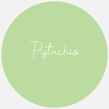 A round sample swatch of Avery Dennison Gloss Permanent Adhesive Vinyl in the colour Pistachio (Pastel Green).