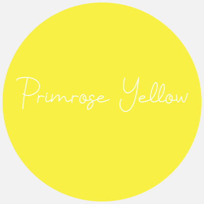 A circular yellow vinyl material with the text 'Primrose Yellow' written on it, indicating the color of the vinyl.