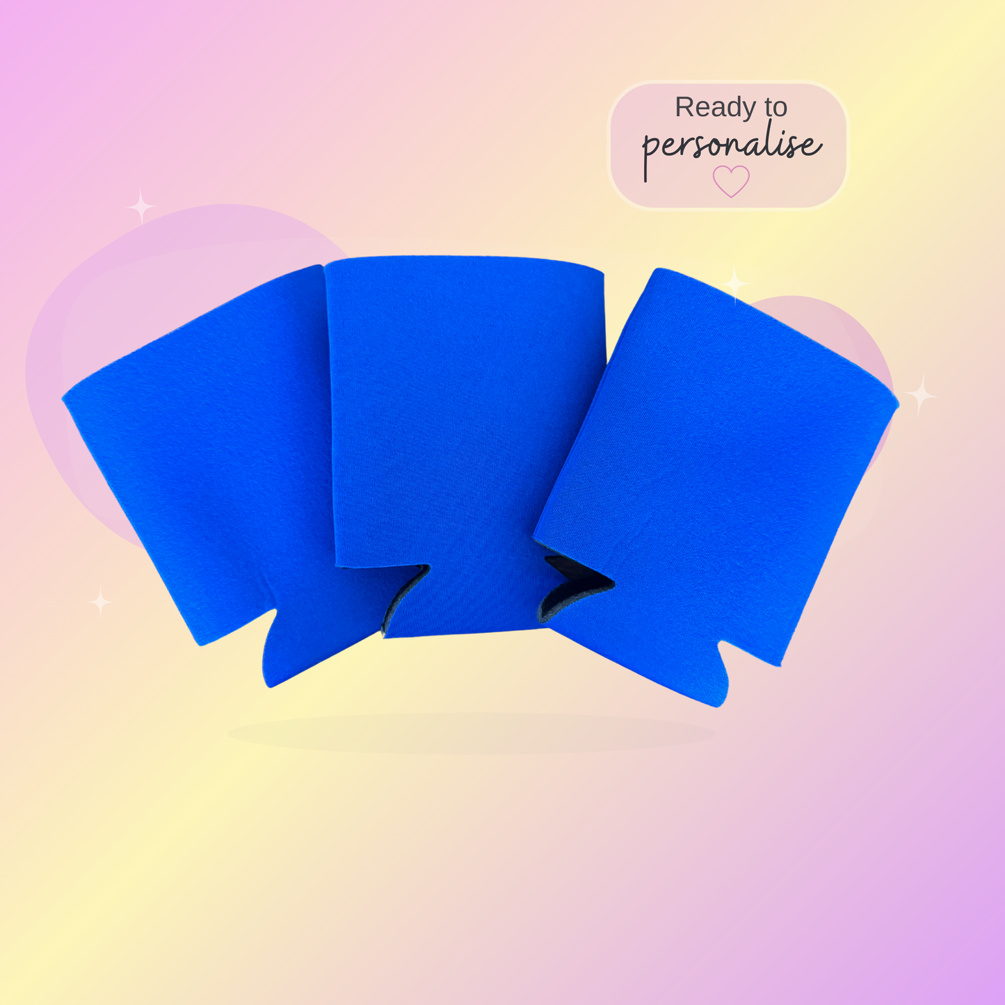 Blue stubby coolers on a pastel gradient background with text 'Ready to personalise'.