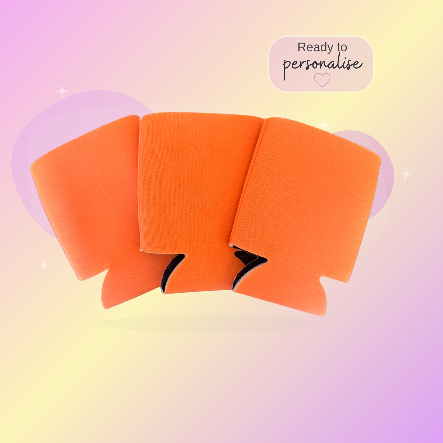 Orange stubby coolers on a pastel gradient background with text 'Ready to personalise'.
