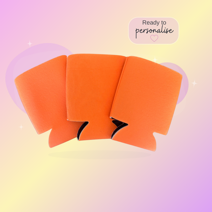 Orange stubby coolers on a pastel gradient background with text 'Ready to personalise'.