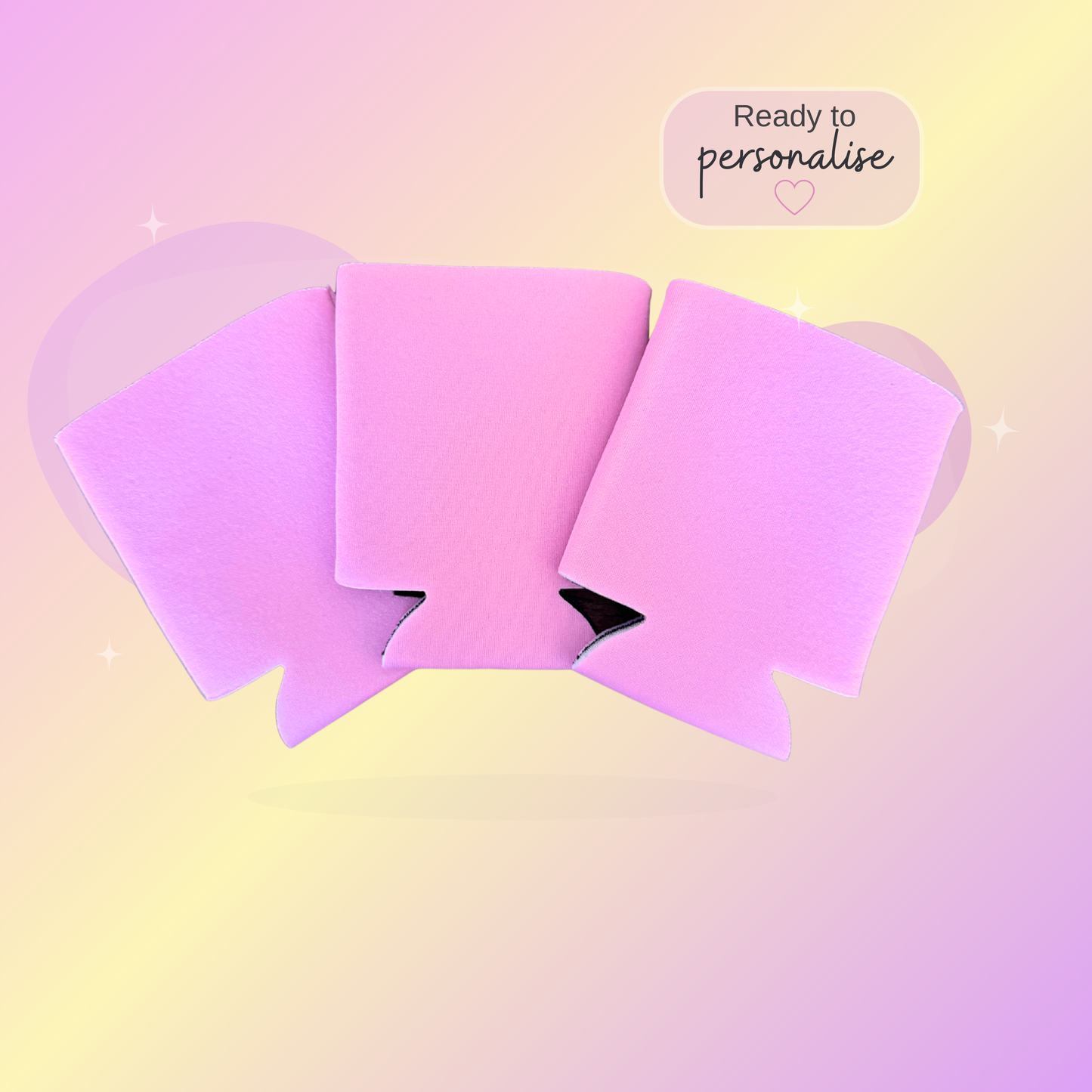 Pastel Pink stubby coolers on a pastel gradient background with text 'Ready to personalise'.