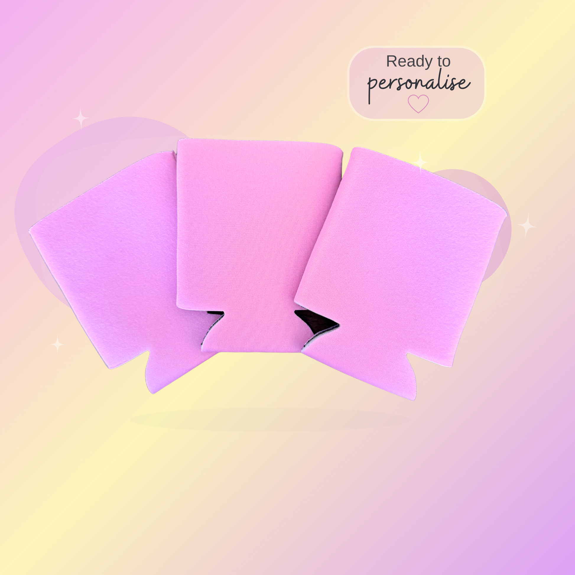 Pastel Pink stubby coolers on a pastel gradient background with text 'Ready to personalise'.