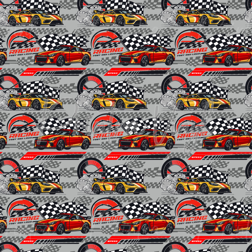 Turbo Tracks patterned vinyl featuring high-performance racing cars, checkered flags, speedometers, tyre smoke, and motorsport graphics in bold red, yellow, black, white, and grey tones on a dynamic race-inspired background.